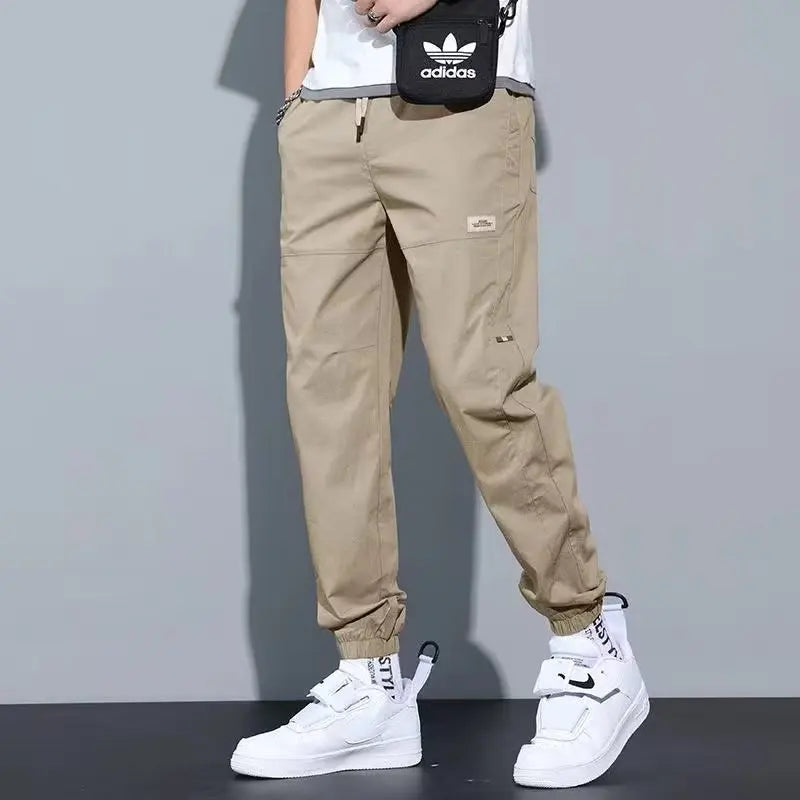 Men's Ice Silk Casual Pants Summer Thin Loose Harlan Nine-Point Trousers Trendy Sports Tools with Tied Feet forVersatile Style