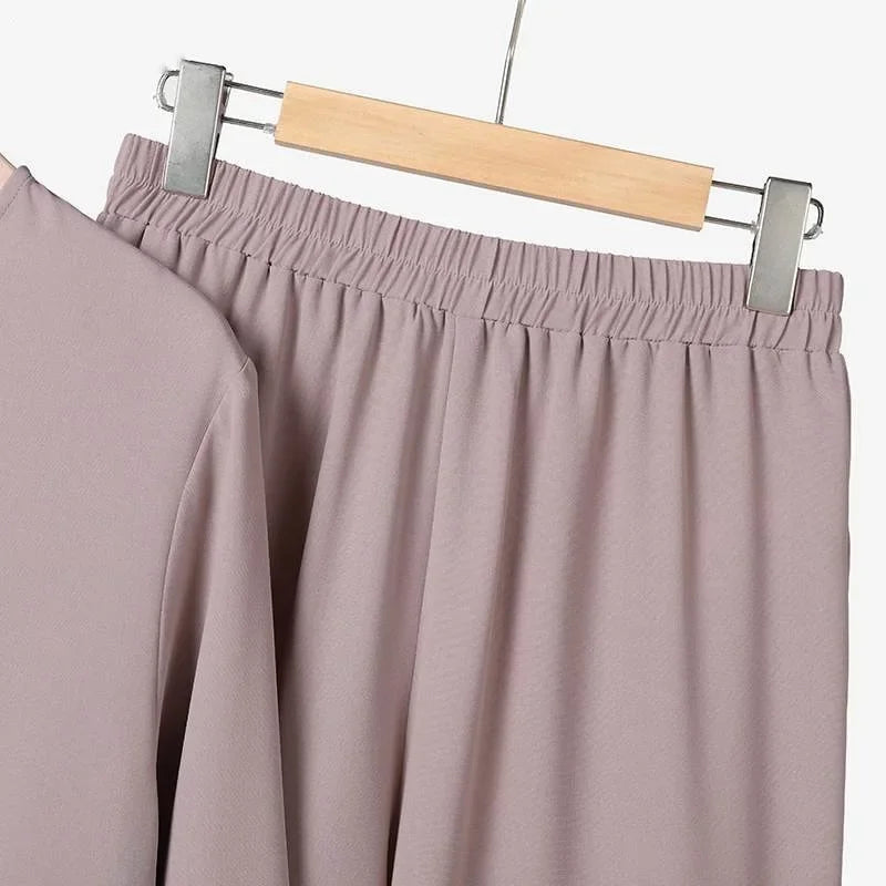 Hot Sale Of The Season Muslim Women's Fashion Casual round Neck Overhead Long Pants Midi Skirt Set Solid Color Middle East Cross