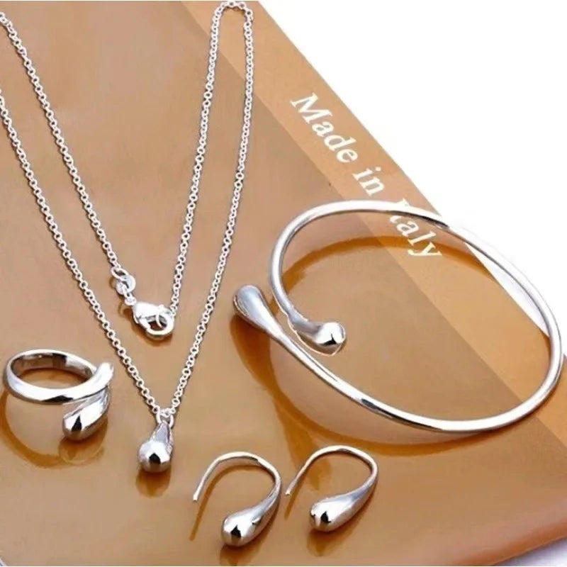 Europe and America  Accessory Water Drop Necklace Four-Piece Set Fashion Bracelets Rings Earrings Necklace Paty Jewerly Set Gift