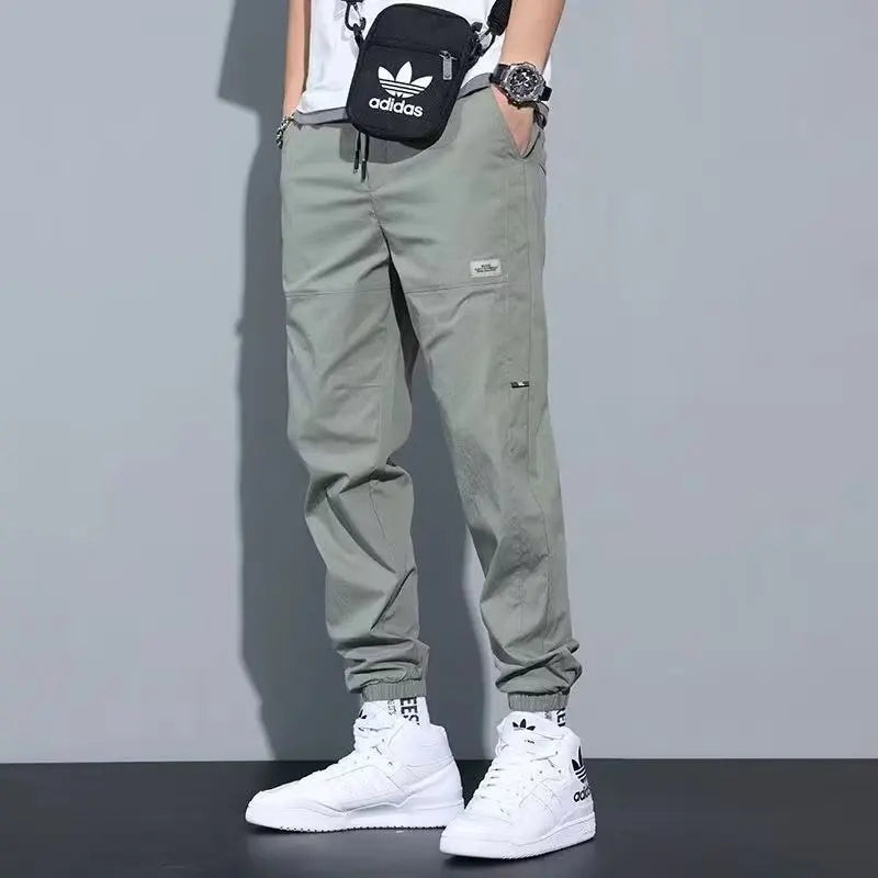 Men's Ice Silk Casual Pants Summer Thin Loose Harlan Nine-Point Trousers Trendy Sports Tools with Tied Feet forVersatile Style