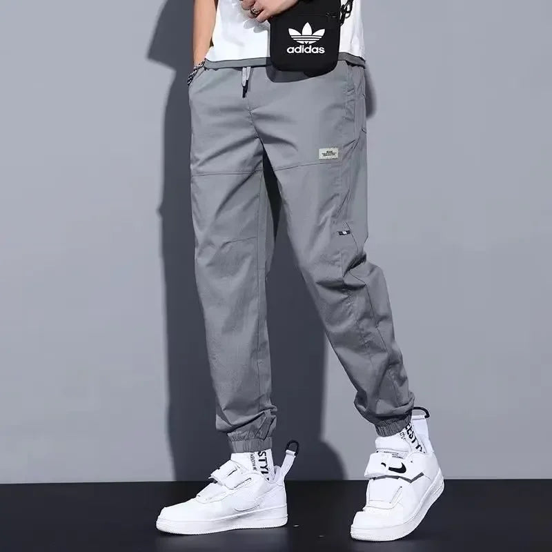 Men's Ice Silk Casual Pants Summer Thin Loose Harlan Nine-Point Trousers Trendy Sports Tools with Tied Feet forVersatile Style