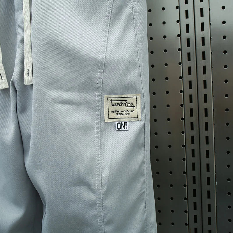 Men's Ice Silk Casual Pants Summer Thin Loose Harlan Nine-Point Trousers Trendy Sports Tools with Tied Feet forVersatile Style