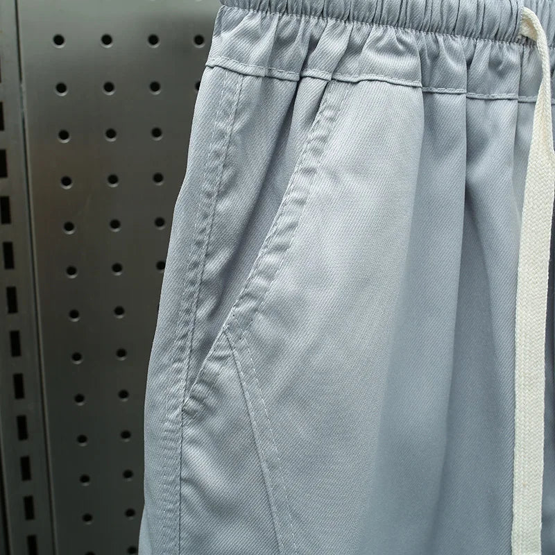 Men's Ice Silk Casual Pants Summer Thin Loose Harlan Nine-Point Trousers Trendy Sports Tools with Tied Feet forVersatile Style